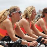Women exercising on stationary bikes