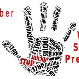 Hand print with stop suicide making up the print